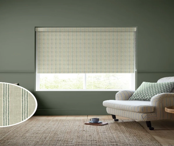 Striped roller blinds in a soft sage green hue