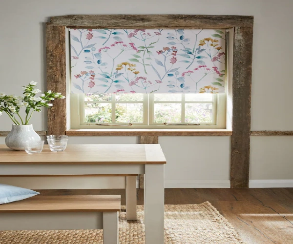 Pastel pink floral roller blinds