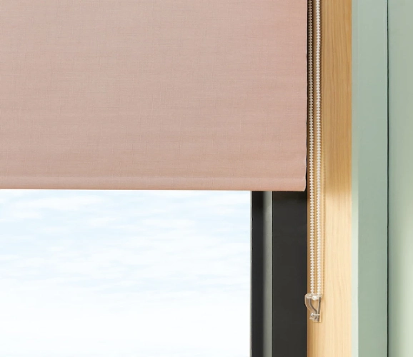 Textured, blush pink roller blind