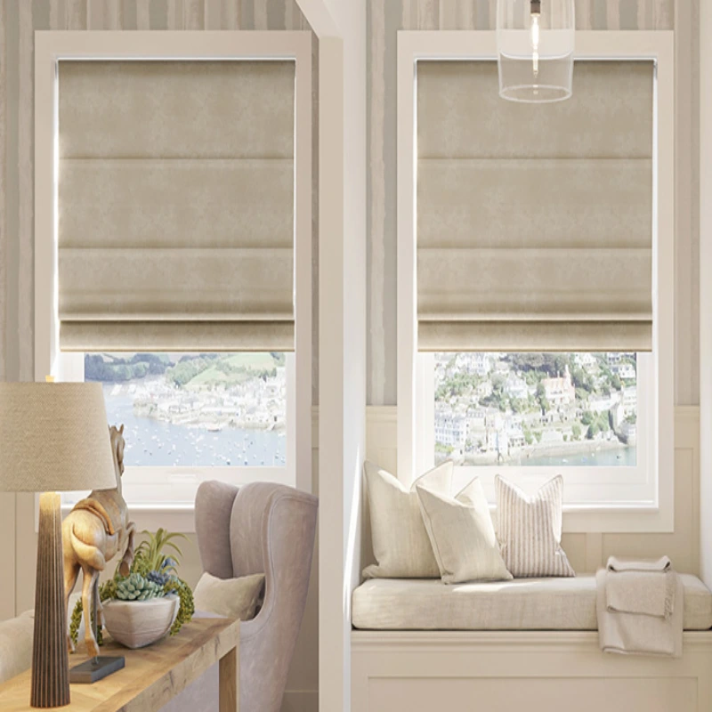 Cozy living room with two windows covered with beige Roman shades, a window seat, and a view of a harbor