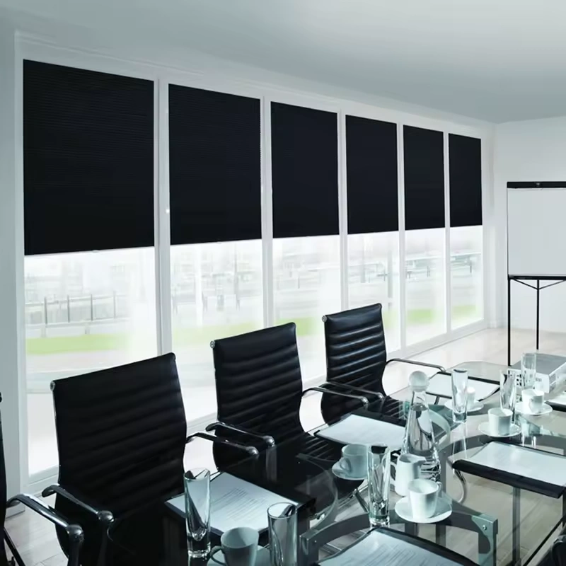 Roman blinds with a subtle pattern offering privacy and a stylish look in a meeting room