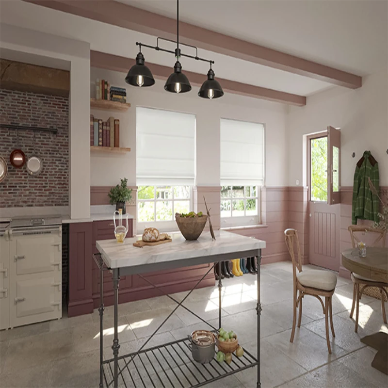 Rustic kitchen with pink walls, a kitchen island, and multiple windows covered with white Roman shades