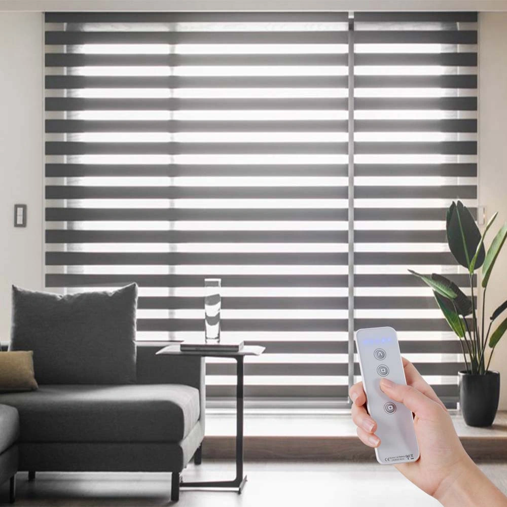 Smart motorized zebra blinds being controlled by remote in a contemporary living room.